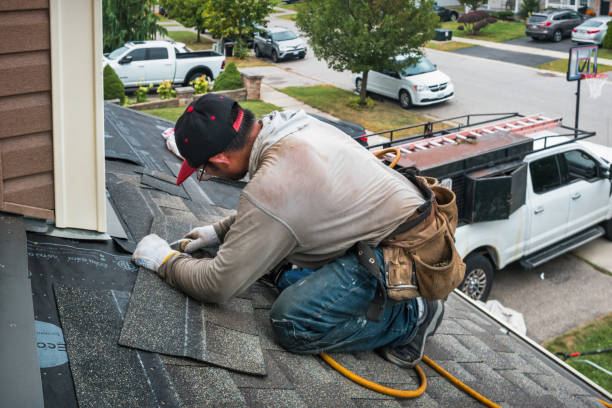 Professional Gutter Repair And Installation technician working in Center Junction, IA